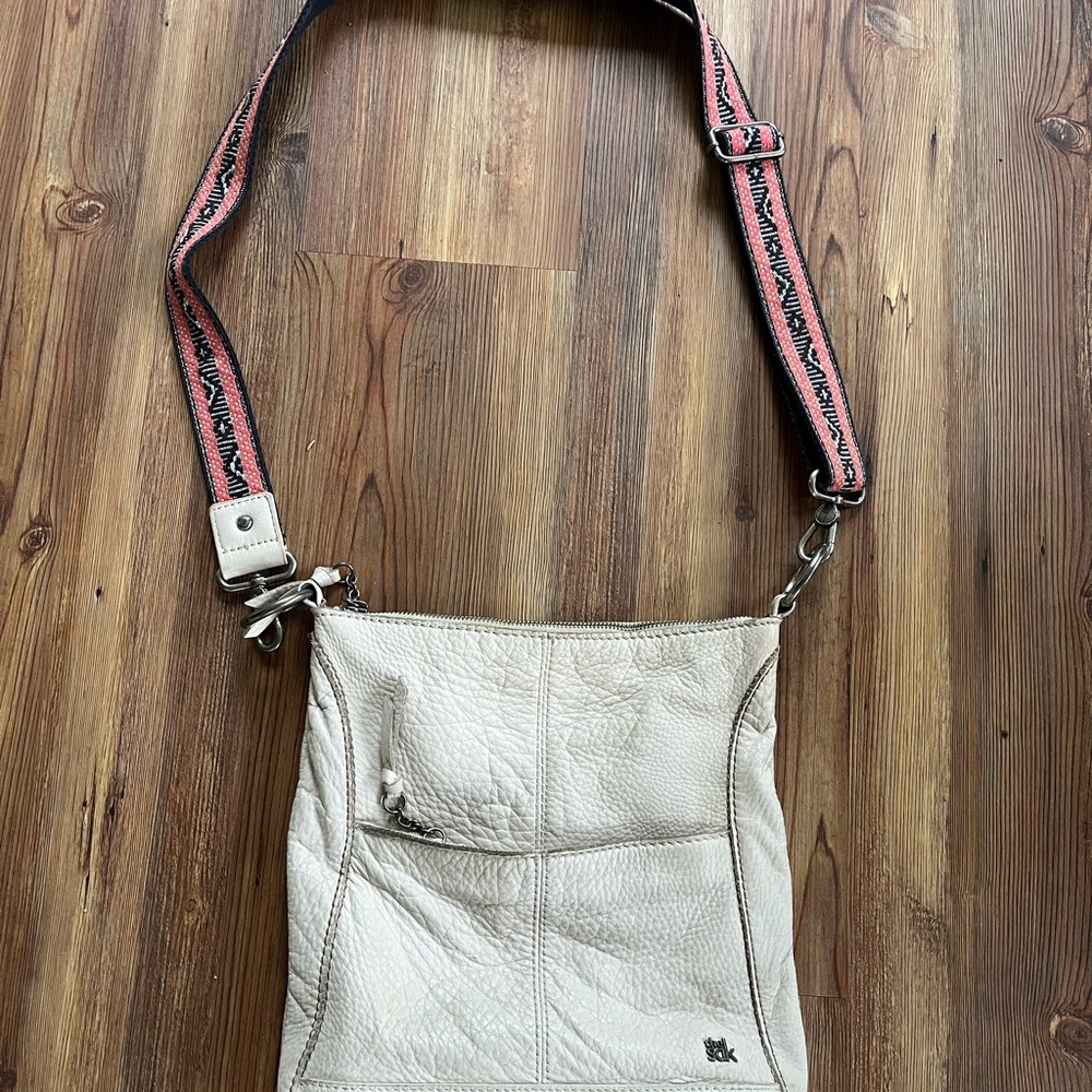 The Sak Cream Leather Crossbody Bag with Pink and Navy Strap